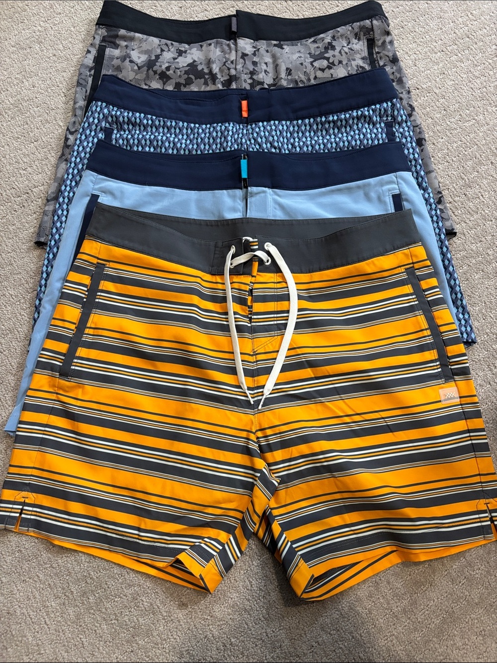 Men's Rhone board short bathing suits.